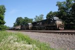 NS 7507 and 7664 take train 668 through Cove PA
